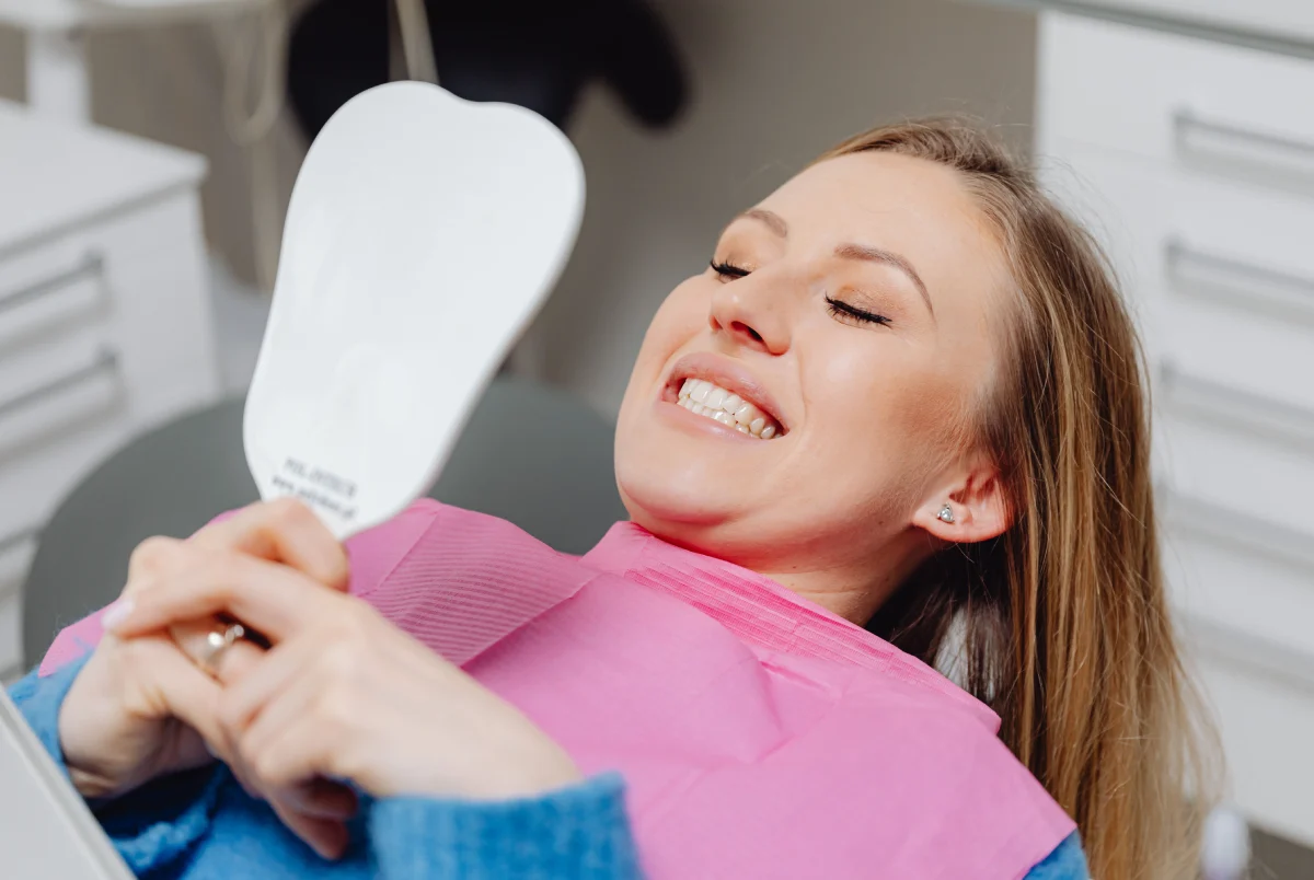Dentist discussing a dental implant treatment plan with a patient at Zeus Dental Clinic in Tirana